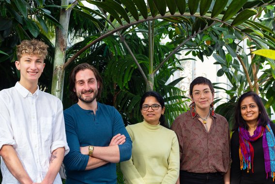 Khokhani lab stands in front of a tree in the Conservatory. From Left Mark, Christos, Pranaya, Milo, Devanshi